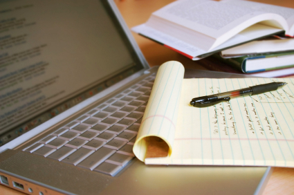 laptop-with-pen-and-books